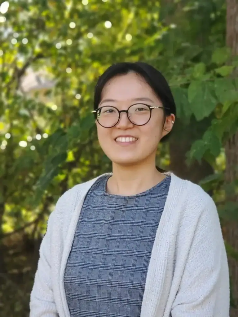 Cecile Binmoeller, Ph.D. smiling outdoors, mental health expert at Pacific Anxiety Group.