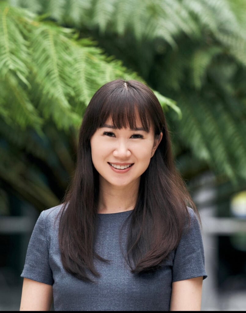 Lisa Choi, Psy.D., smiling outdoors at Pacific Anxiety Group.