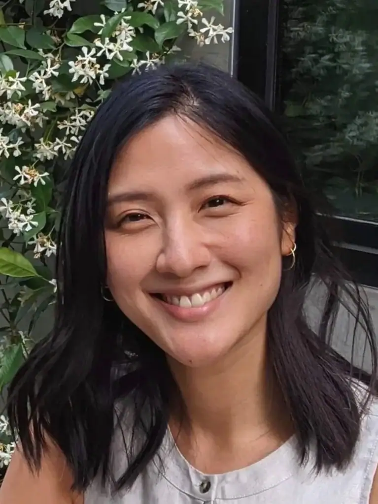 Portrait of Zlatena Theodore, Psy.D., smiling outdoors at Pacific Anxiety Group.